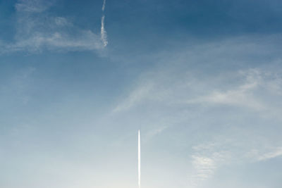 Low angle view of vapor trail in sky