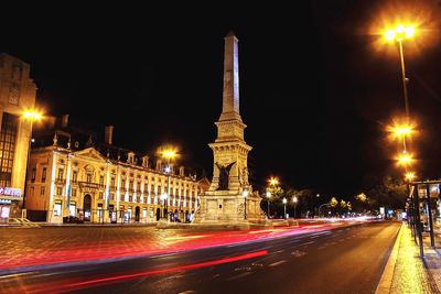 Light trails on city street at night