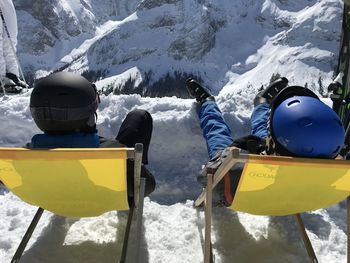 Panoramic view of people on snowcapped mountains