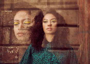 Double exposure of woman with yellow eyeshadow