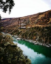 River flowing through bridge