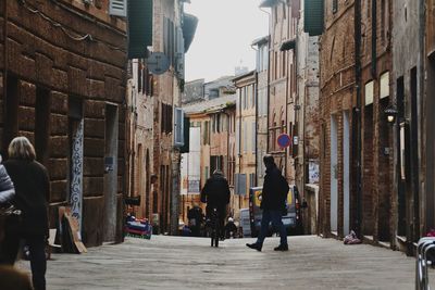 People on street in city