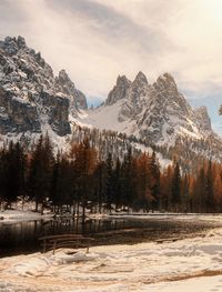 Scenic view of snowcapped mountains against sky