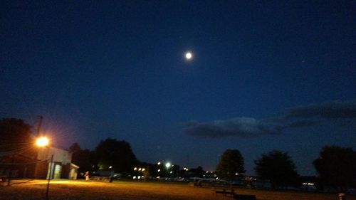Illuminated street light at night