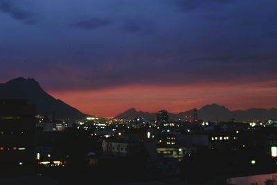 Illuminated cityscape at night