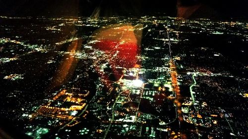 Illuminated cityscape at night