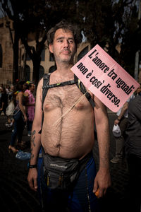 Portrait of man standing with text