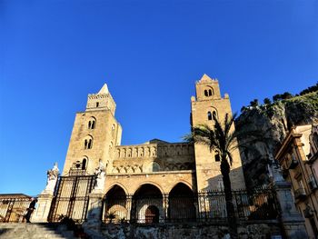 Low angle view of cathedral against blue sky