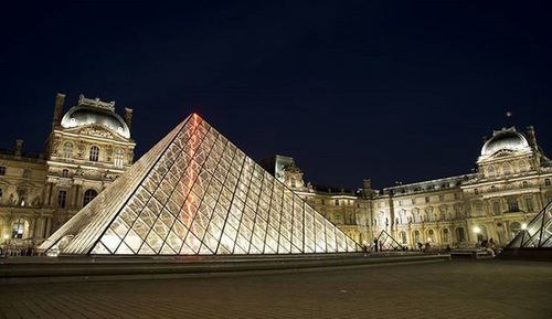 Low angle view of government building at night