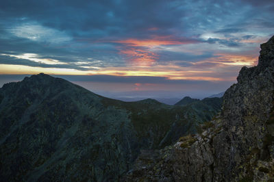 Scenic view of mountains against sky during sunset