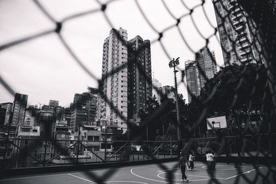 Urban life - playing basketball in the middle of the city