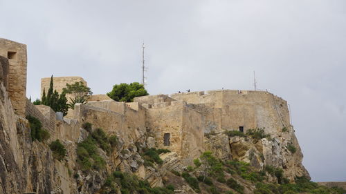 Low angle view of historic building against sky