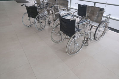 High angle view of bicycle parked on tiled floor