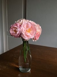 Close-up of rose petals on table