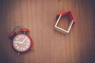 Directly above shot of clock on table