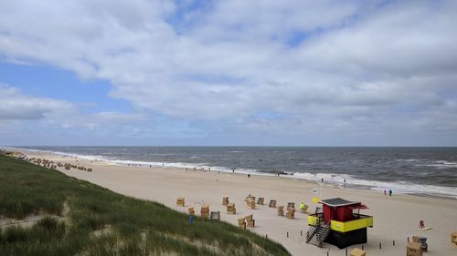 Scenic view of beach against sky