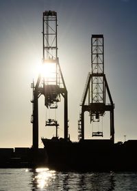 Silhouette of crane at sunset