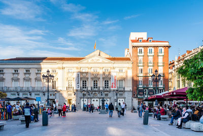 Group of people in front of building