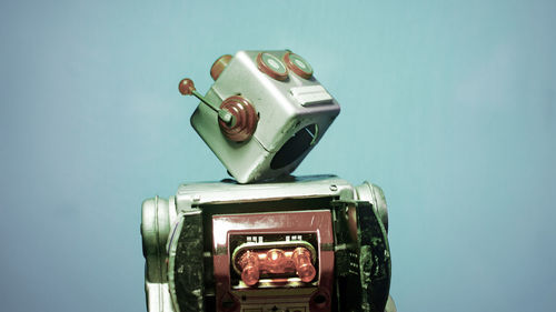 Close-up of toy car against blue background