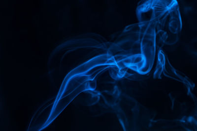 Close-up of smoke against black background