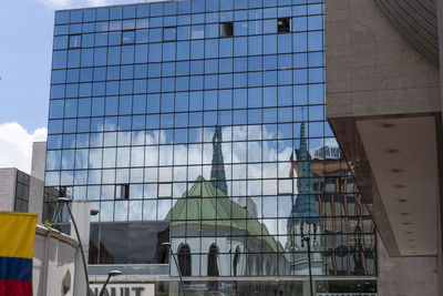 Low angle view of modern buildings against clear sky