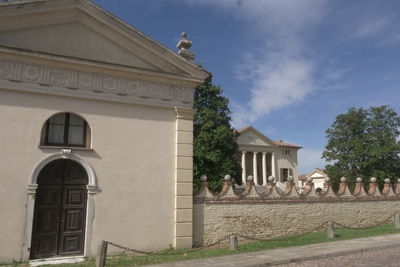 Exterior of historic building against sky