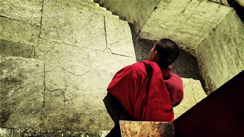 High angle view of monk on steps