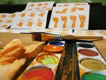 Close-up of paintbrushes on table