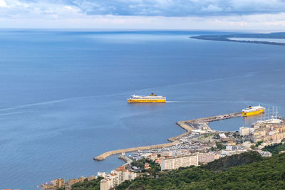 High angle view of ship in sea against sky