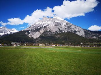 Scenic view of snowcapped mountain against sky