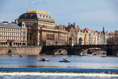 Beautiful old town of prague city, vltava river and the iconic charles bridge seen from kampa park