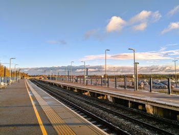 Railroad station platform against sky