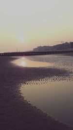 Scenic view of sea against sky at sunset