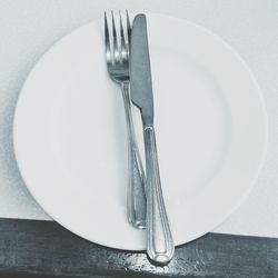 Close-up of fork on white background