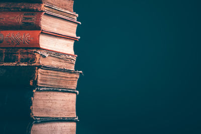 Close-up of old stack of books