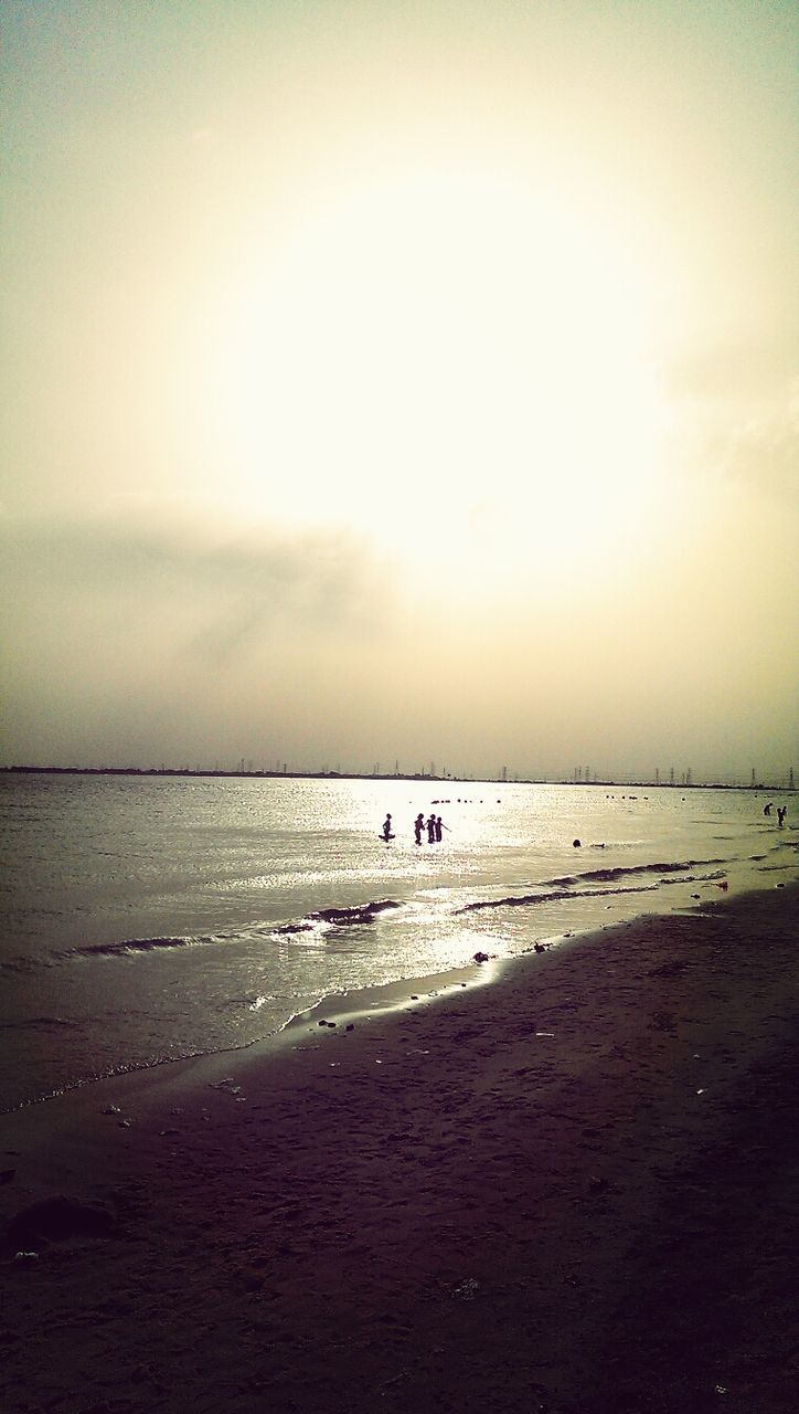 sea, beach, horizon over water, water, shore, sand, scenics, tranquil scene, tranquility, sunset, sky, beauty in nature, nature, idyllic, incidental people, nautical vessel, coastline, outdoors, boat, wave