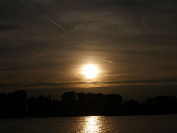 Scenic view of calm sea at sunset