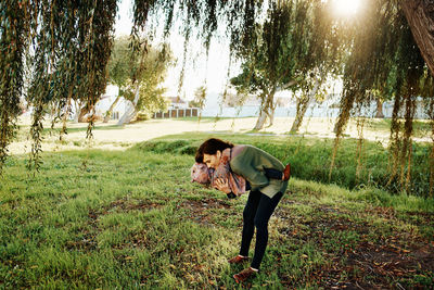 Rear view of women on field