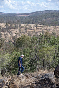 Side view of a man on landscape