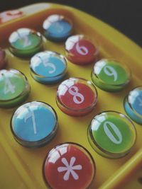 Close-up of multi colored water on table