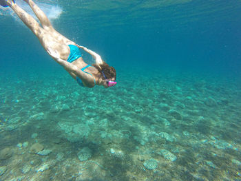 Man swimming in sea