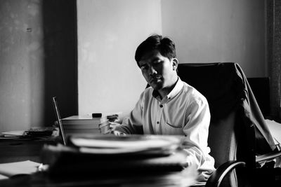 Businessman working at desk in office