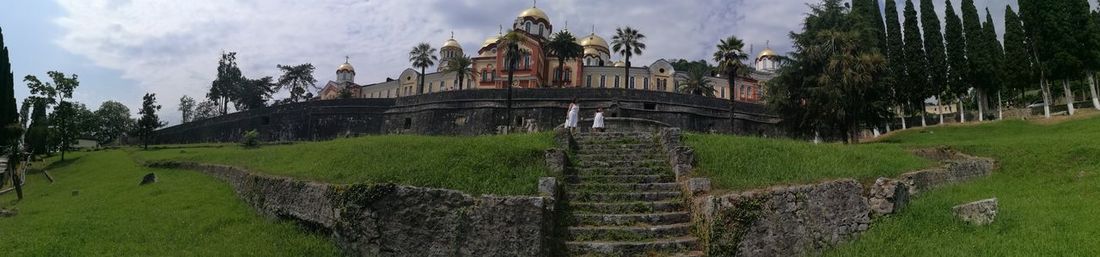 Panoramic view of temple against cloudy sky