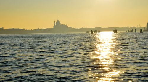 Scenic view of sea at sunset