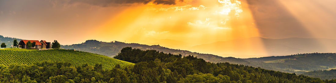 Scenic view of mountains against sky during sunset