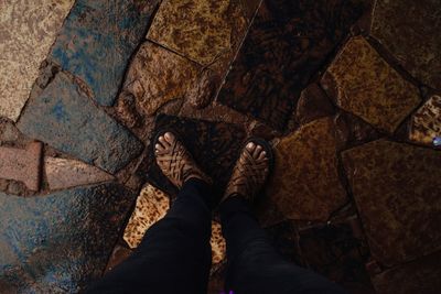 Low section of people standing on footpath