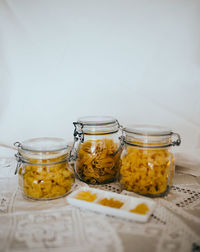 Close-up of glass jar on table