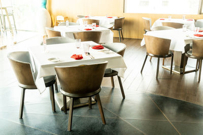 Table and chairs in restaurant