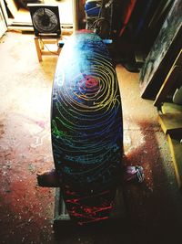 High angle view of multi colored glass on table by street