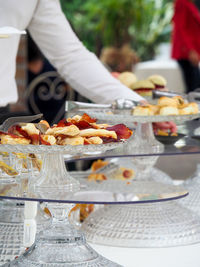 Midsection of man preparing food